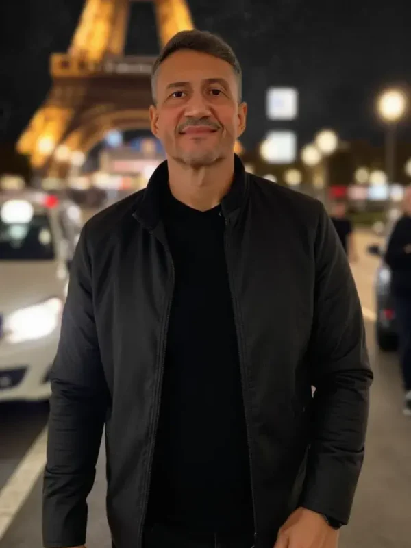 a_young_man_with_light_skin_short_styled_brown_hair_and_a_well-groomed_beard_walks_confidently_on_a_rsjkt3fw0n9qwo67o87q_0